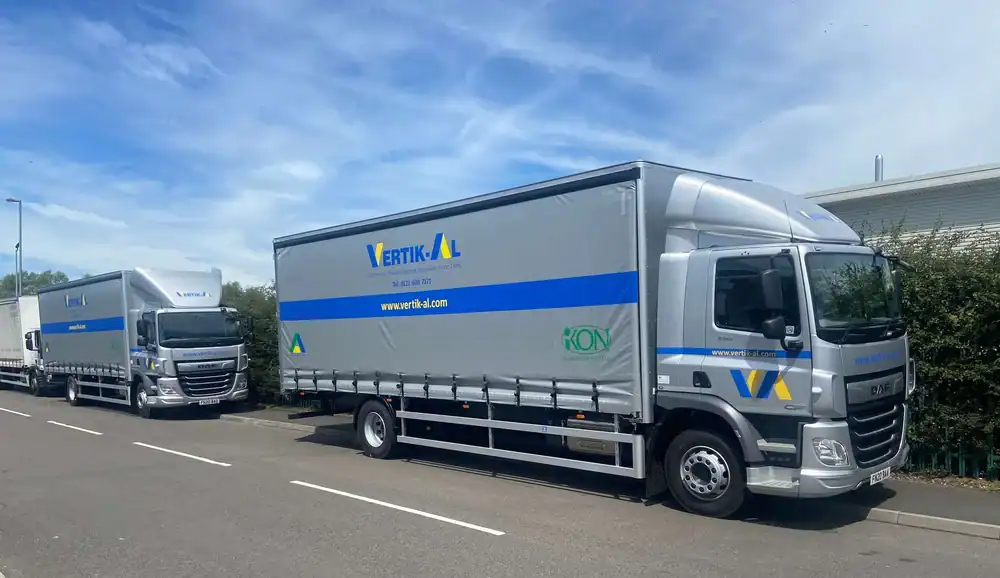 Two branded Allumette Group fleet vehicles parked on a roadside showing IKON Aluminium Systems and Vertik-Al livery