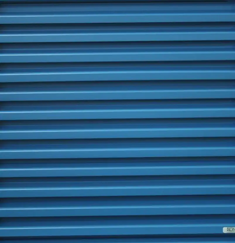 Blue aluminium IKL33 stackable louvre with horizontal blades set at 60 degree angle creating a continuous facade appearance